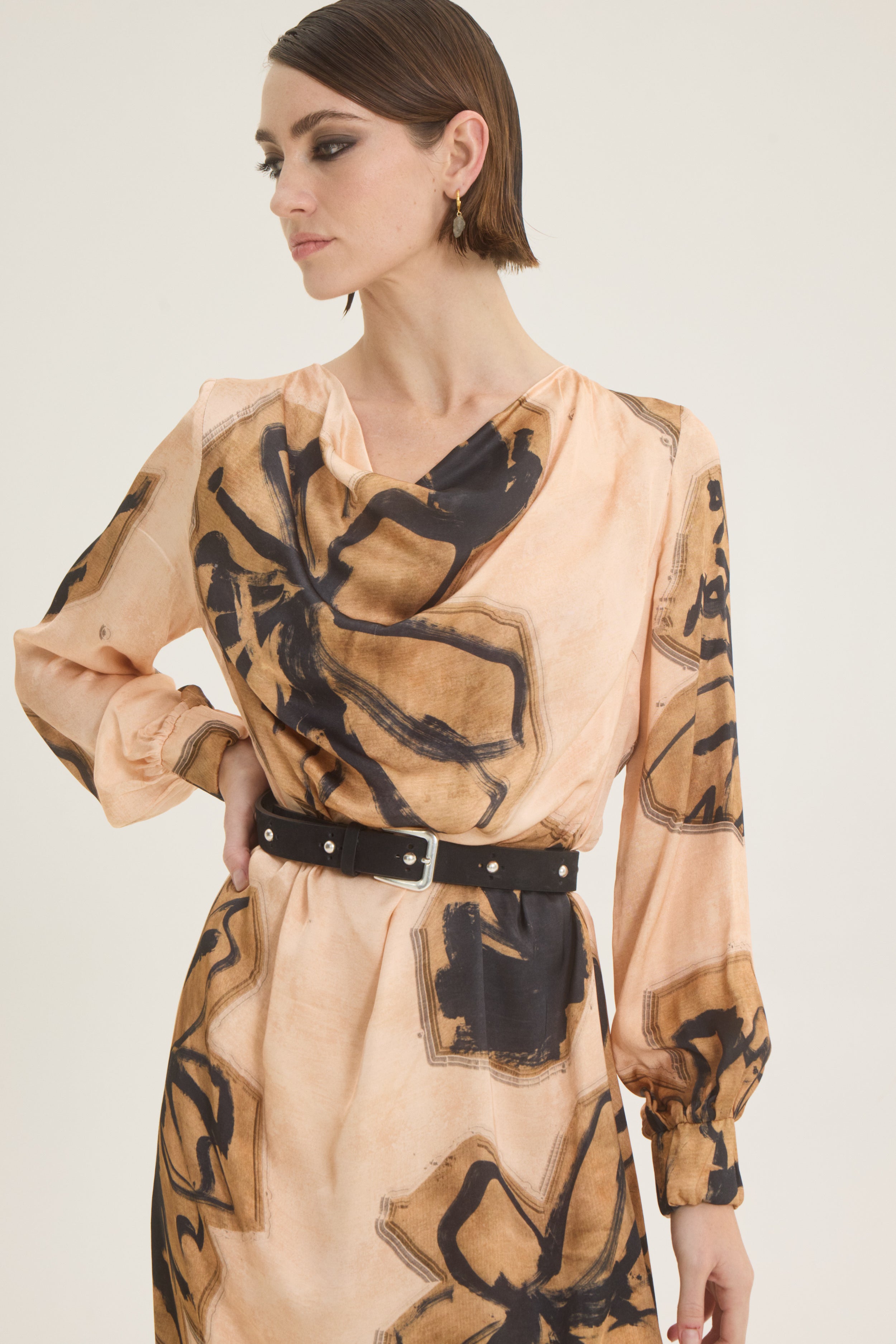 Draped beige-black printed dress