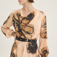 Draped beige-black printed dress