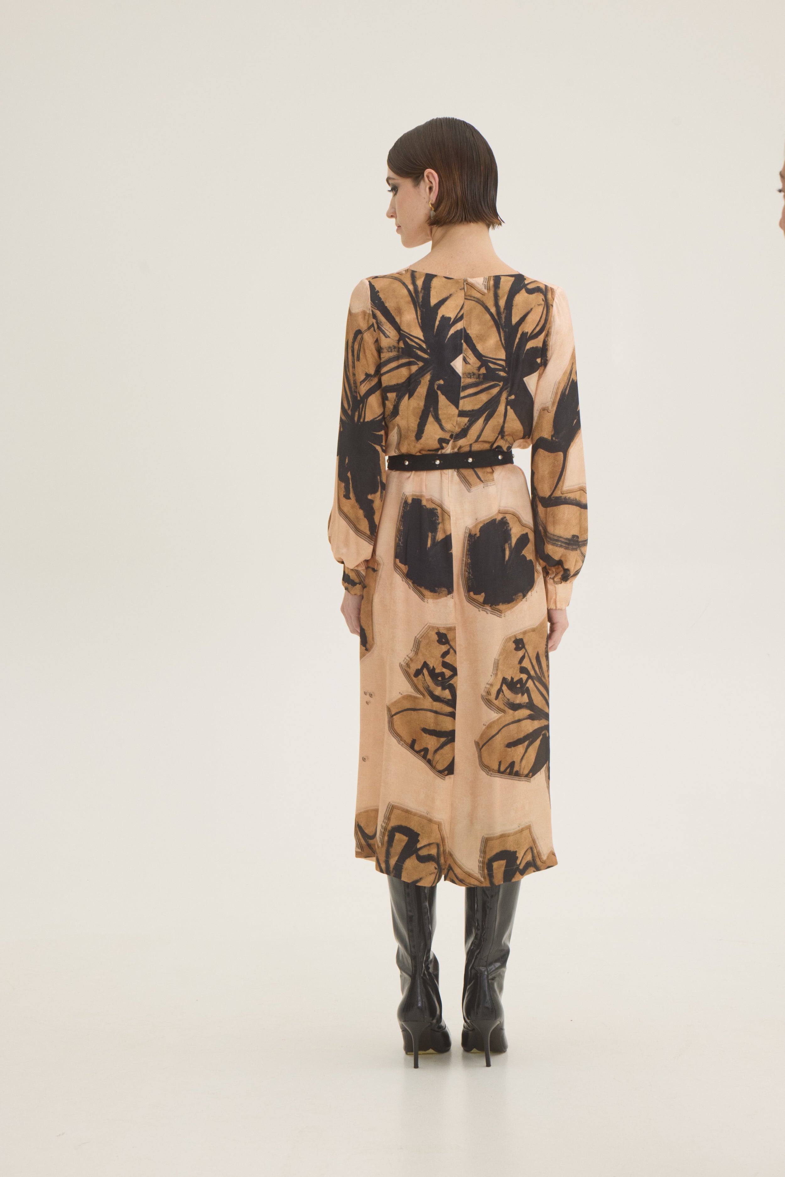Draped beige-black printed dress